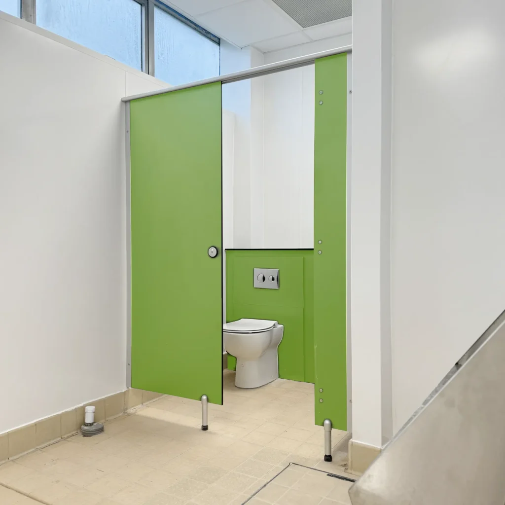 green washroom cubicle
