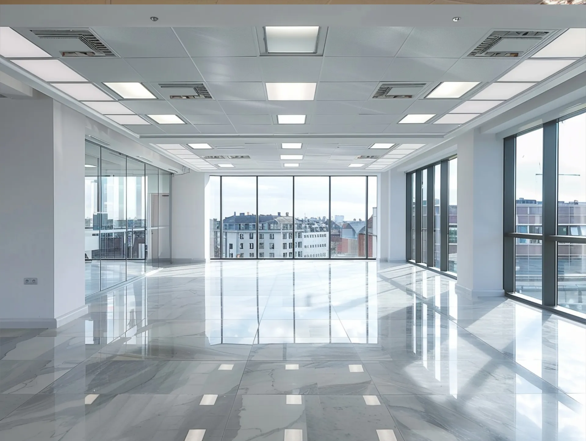 A newly painted and decorated office space with bright lighting and clean lines.